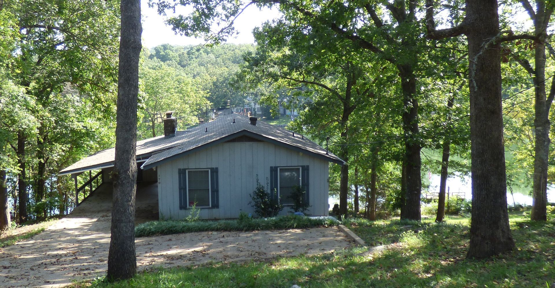 A small house in the middle of a forest