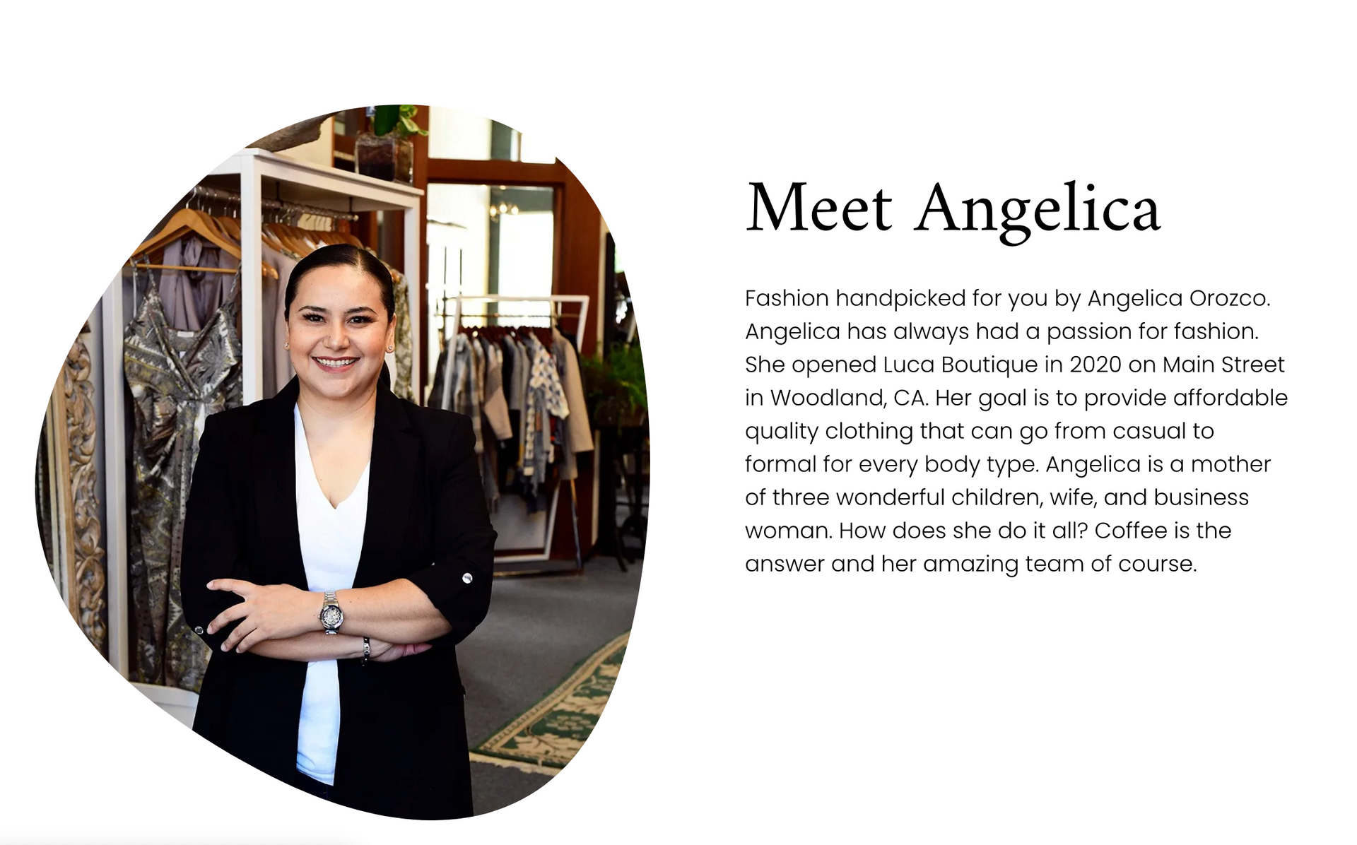 a woman is standing in front of a closet with her arms crossed .