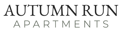"AUTUMN RUN" in bold, dark font, "APARTMENTS" in a lighter, smaller font below it.