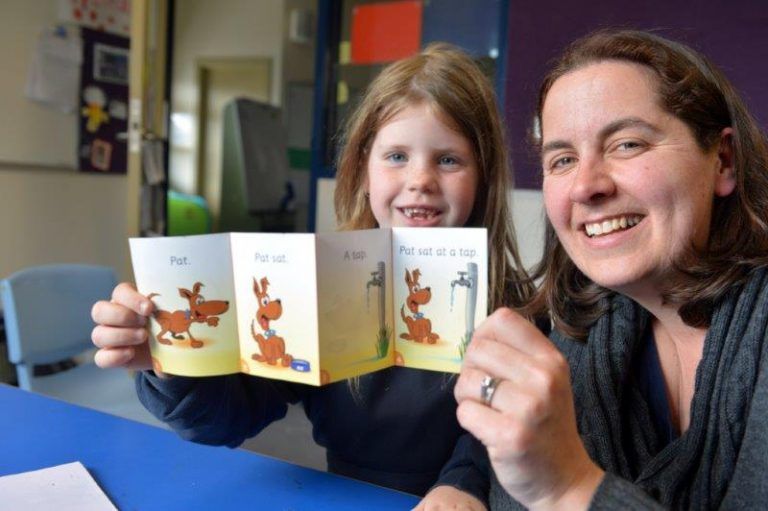 Sarah Asome and child reading