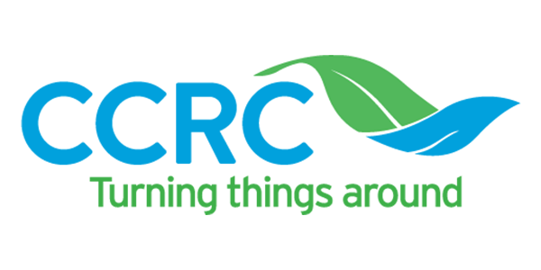 A blue and green logo for ccrc turning things around