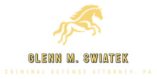 A logo for Glenn M. Swiatek Criminal Defense Attorney.