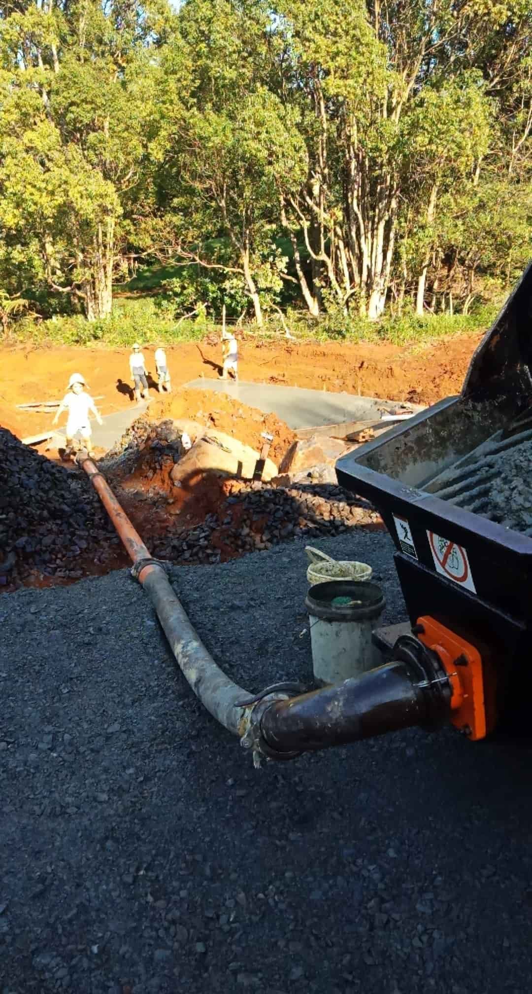 A Concrete Pump Dispenses Concrete Into a Construction Site — Coota & Son's Concrete Pumping In South Gundurimba, NSW