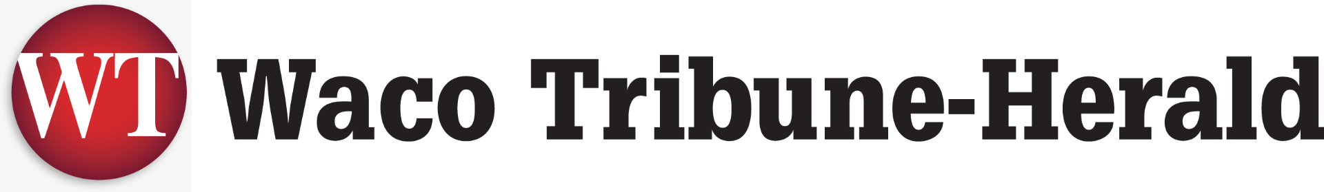 Wooden cabin with red doors at dusk, framed by trees and a colorful sky.