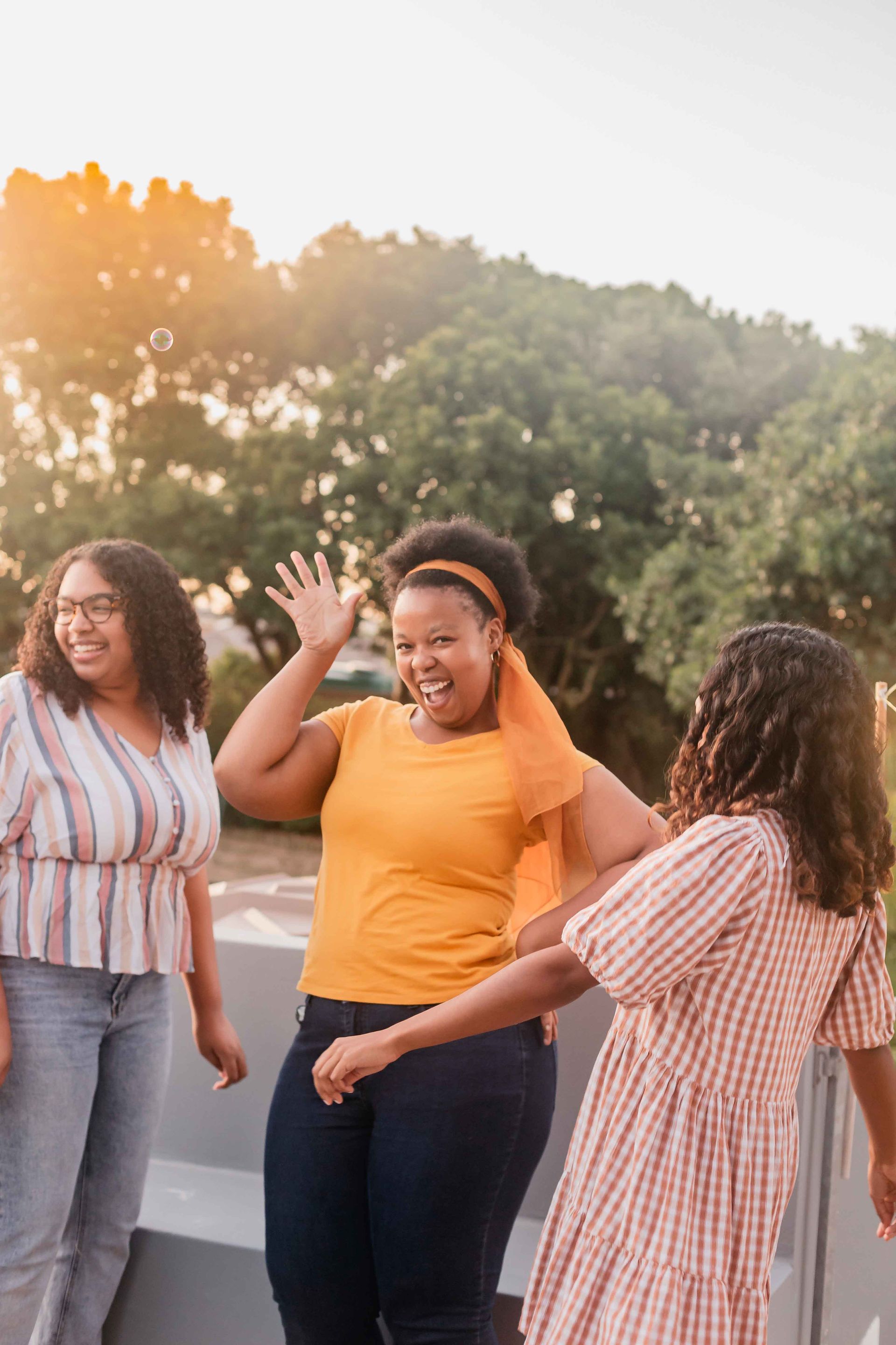 Trustworthy attorneys in Houston—group of women standing together and waving
