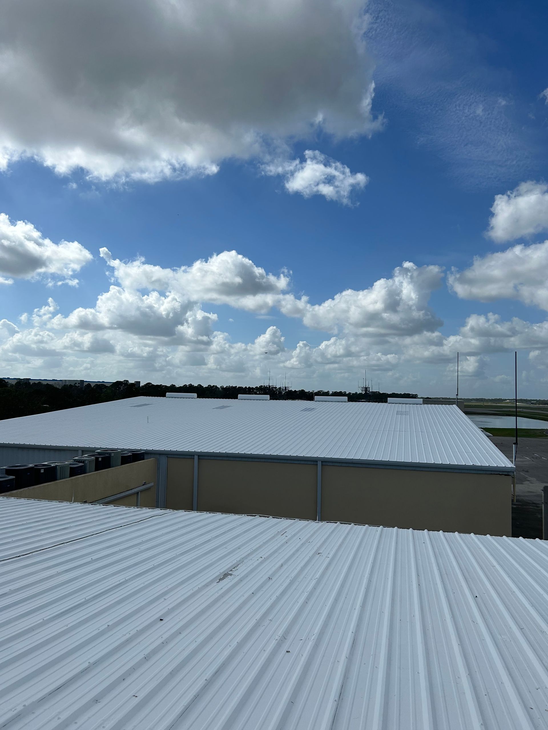 An elastomeric roof coating on a commercial roof in central Florida