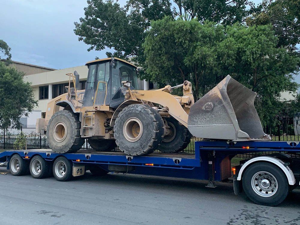 Bulldozer On The Truck — Mildura, VIC — Morello Earthmoving Pty Ltd