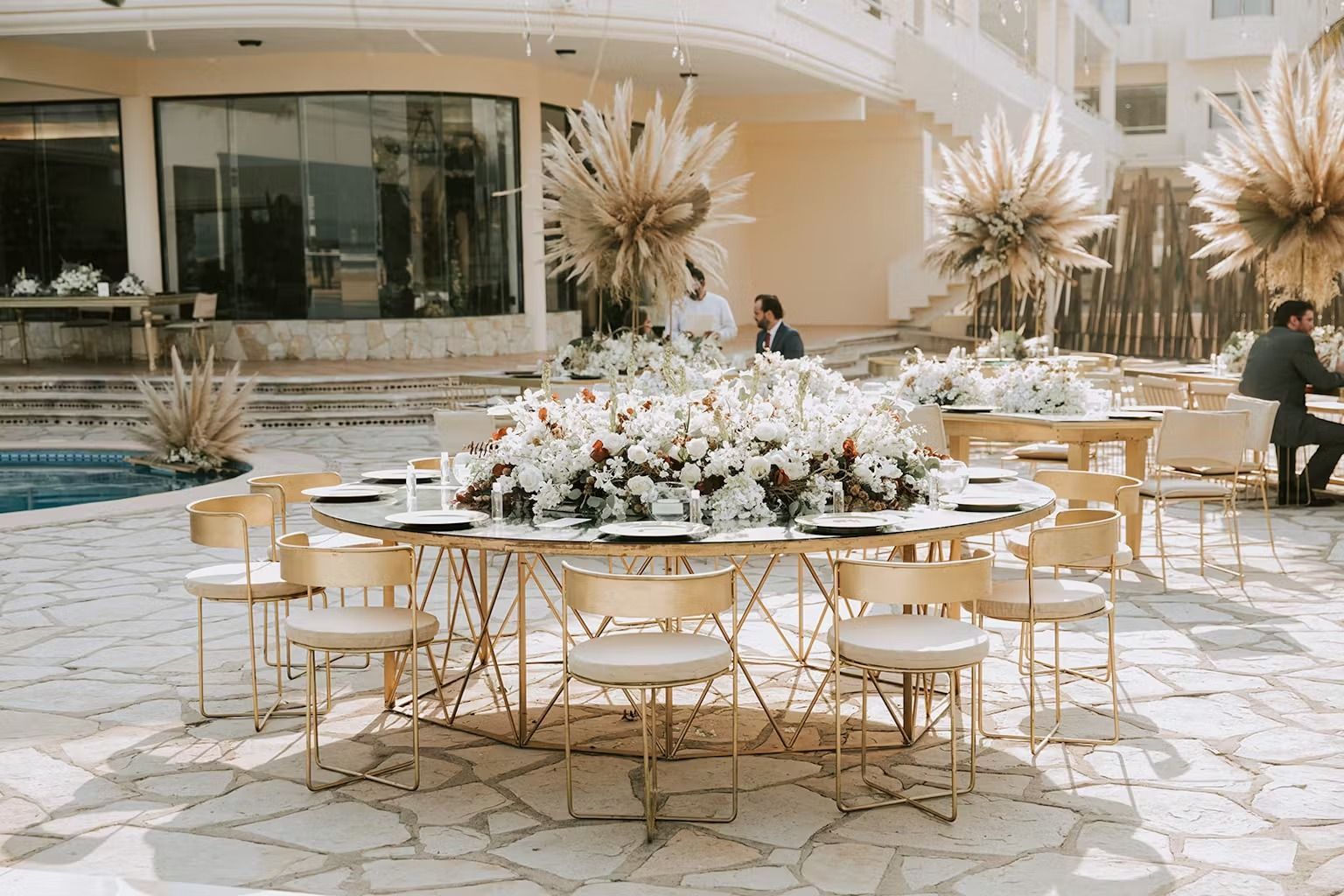 A table and chairs are set up for a wedding reception.