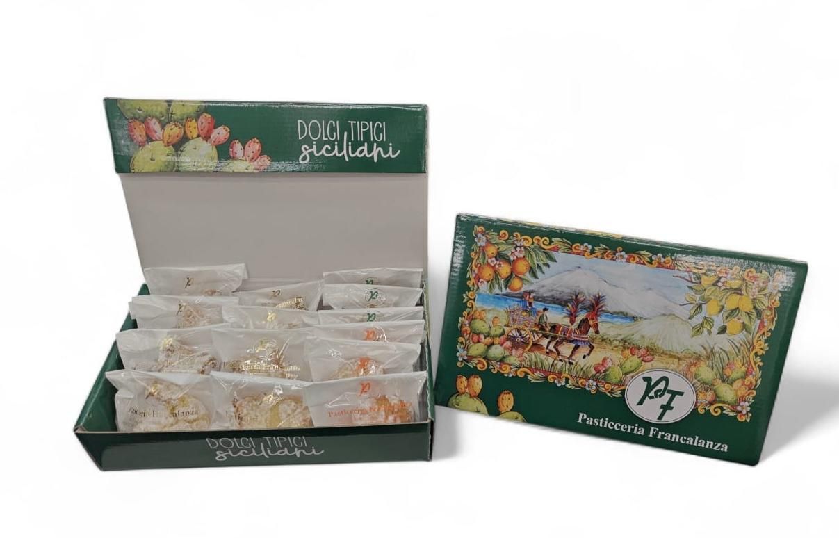 Scatola di caramelle confezionate con un disegno verde e bianco.