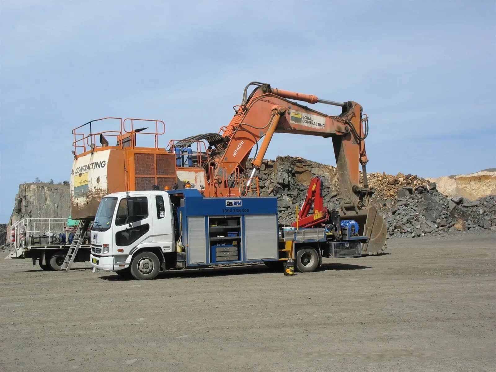 A Large Digger Getting Repaired — Plant Maintenance in Unanderra, NSW