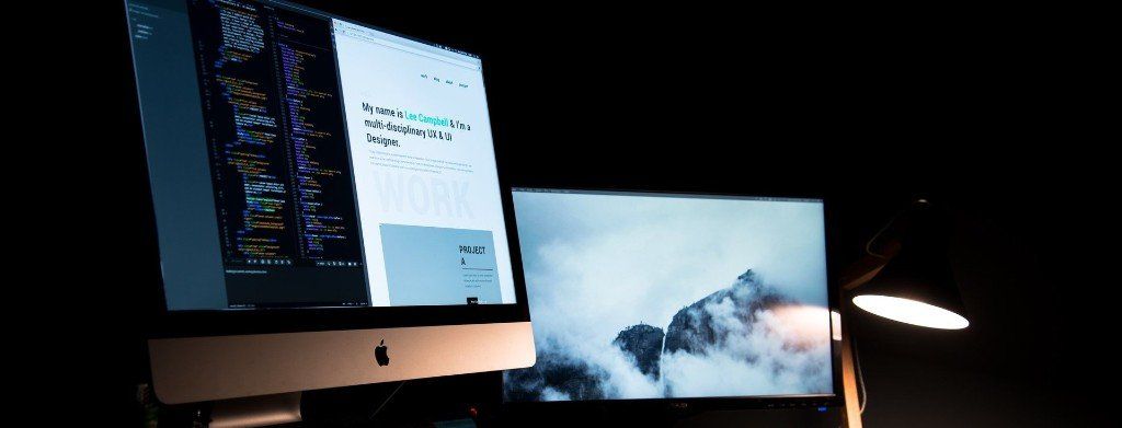 Picture of a work space with two computers