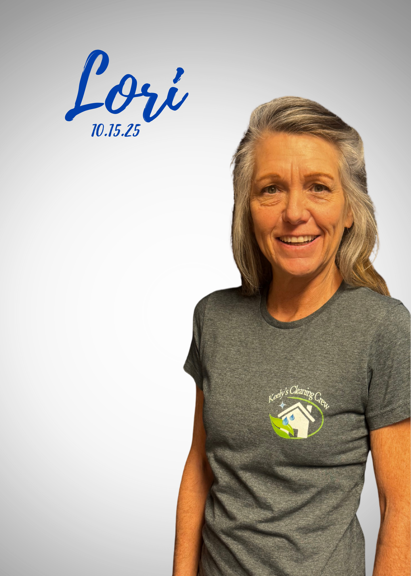 A woman is cleaning a bathroom counter with a towel.