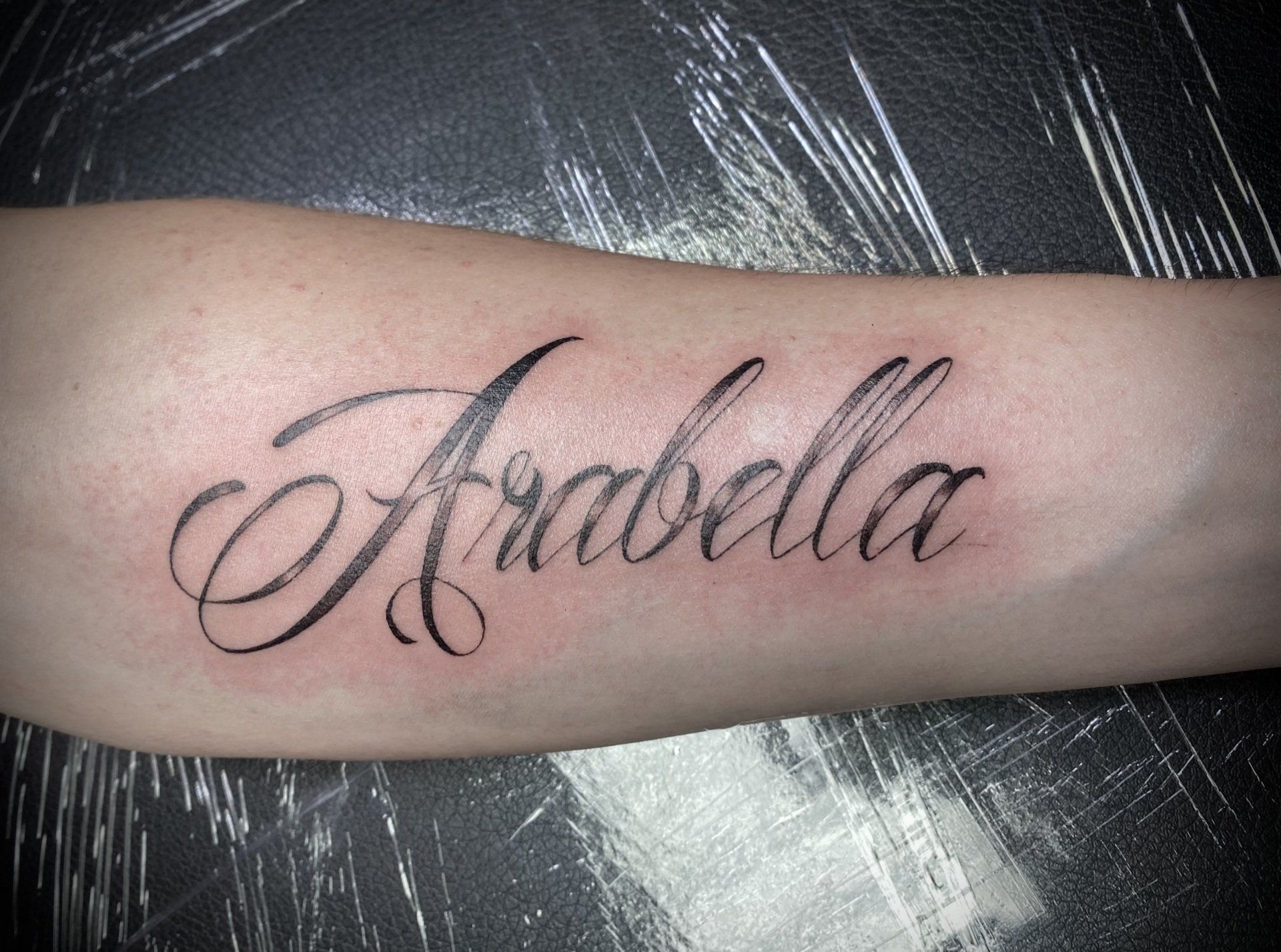 Name tattoo fine line