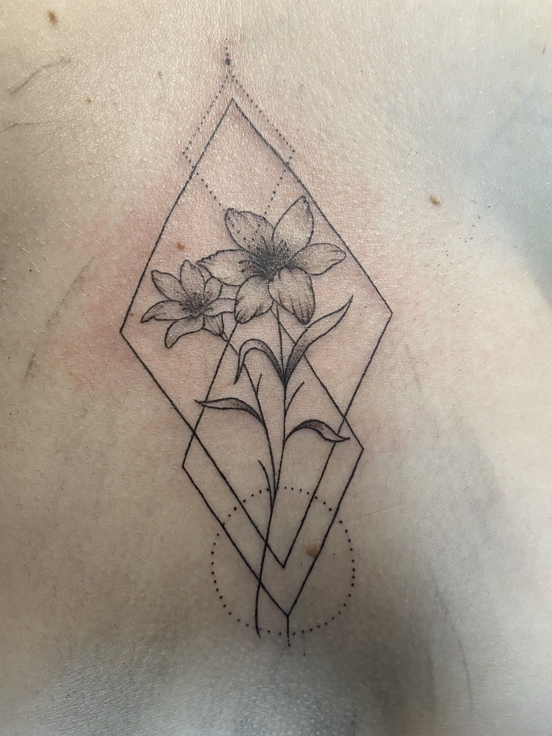 Fine linework tattoo