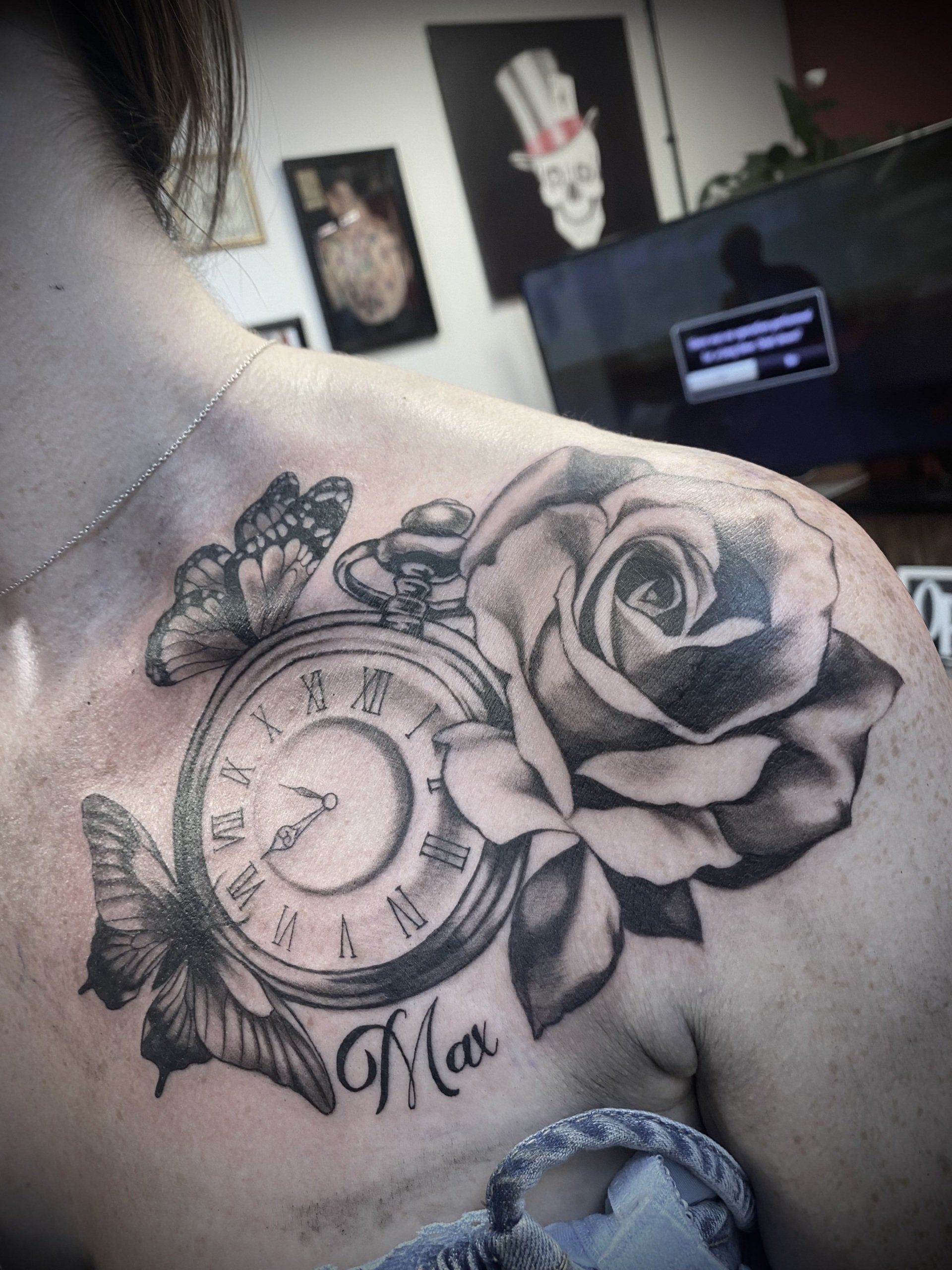 Butterflies, pocket watch and roses feminine tattoo 