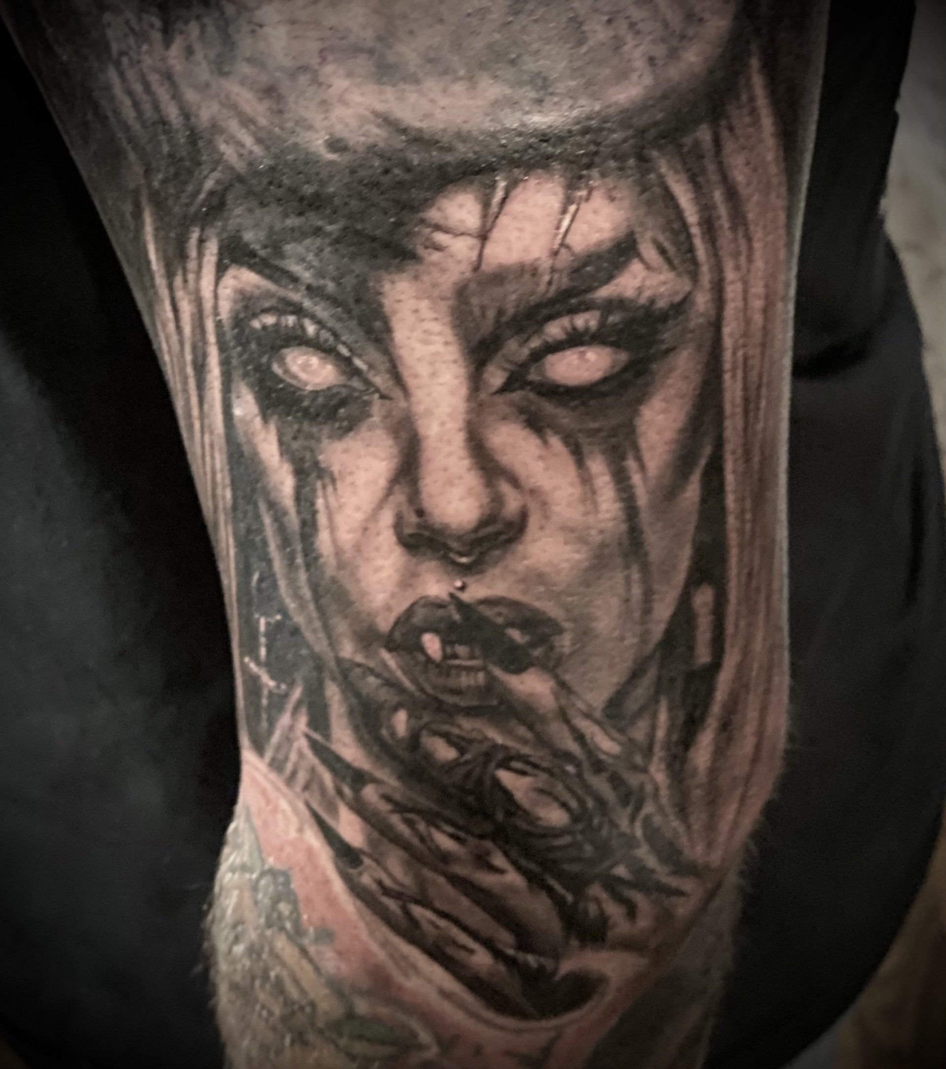 Female portrait tattoo