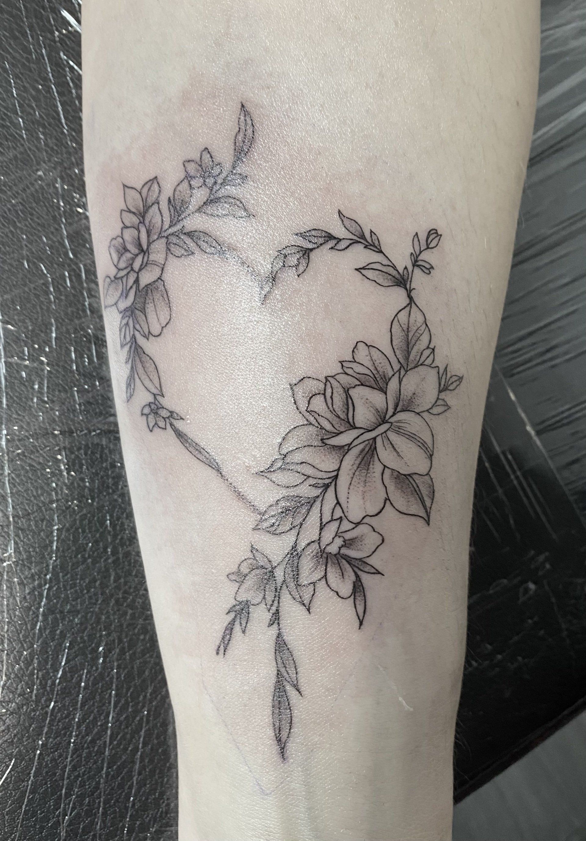 Fine linework feminine tattoo 