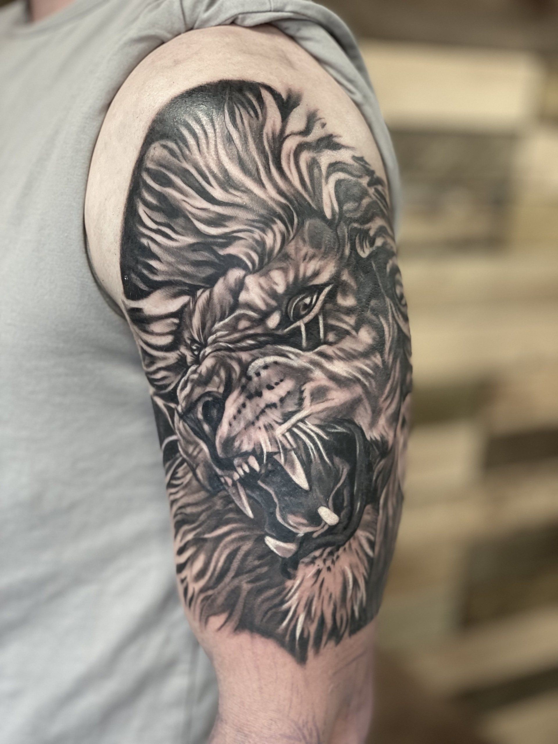 Lion portrait tattoo