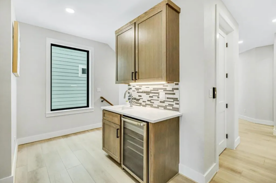 Living space in custom Port Aransas home by Innovo Residential