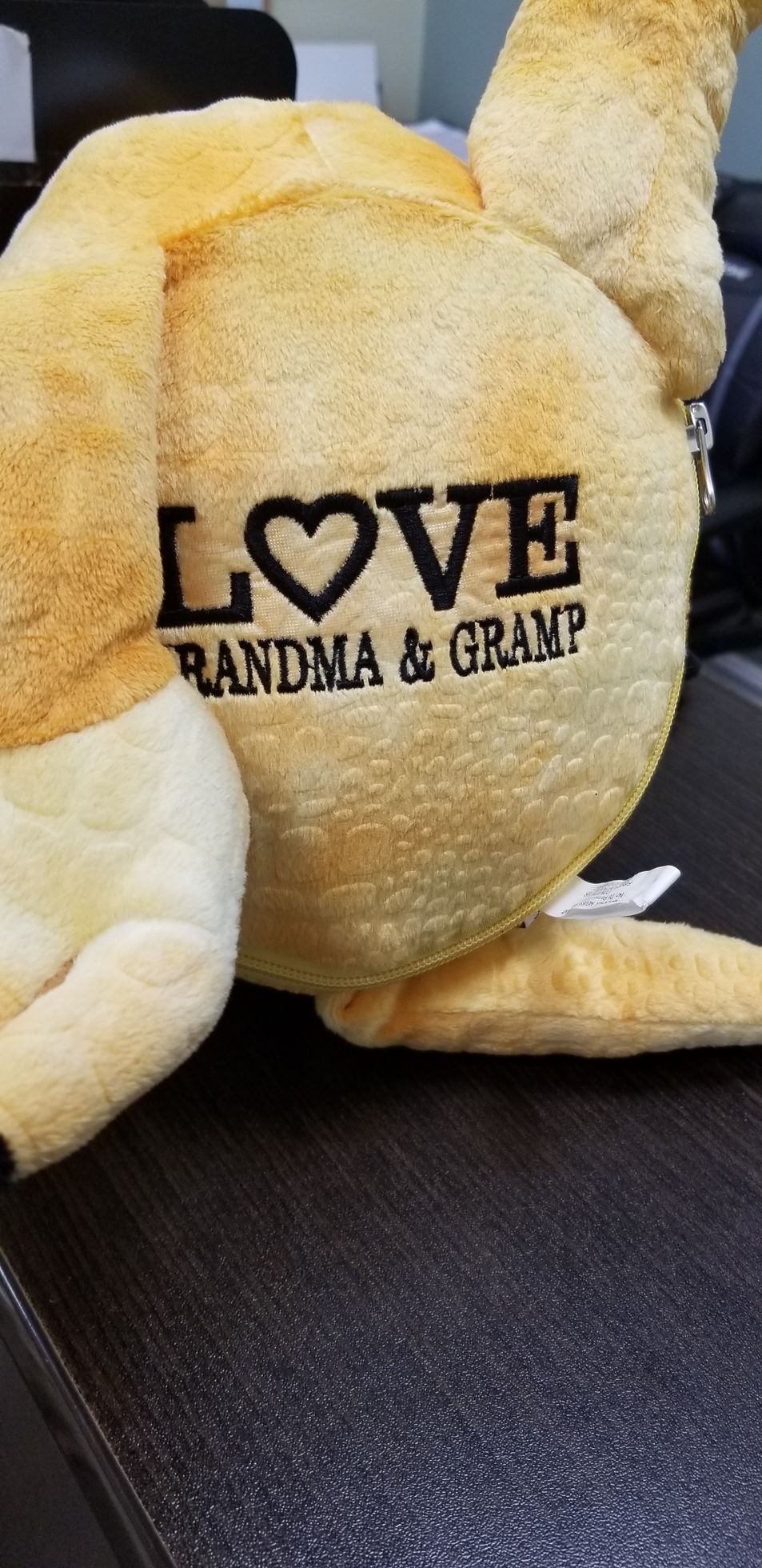 Yellow stuffed animal with 
