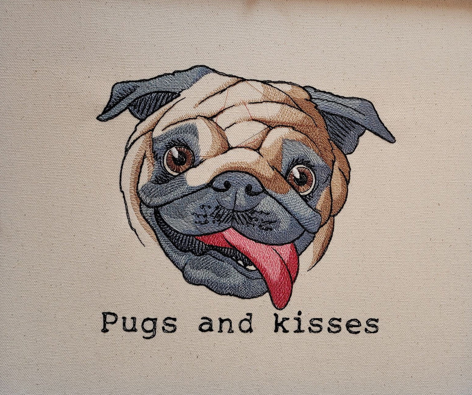 Pug embroidered on fabric, with brown, tan, and gray fur, red tongue. Text reads 