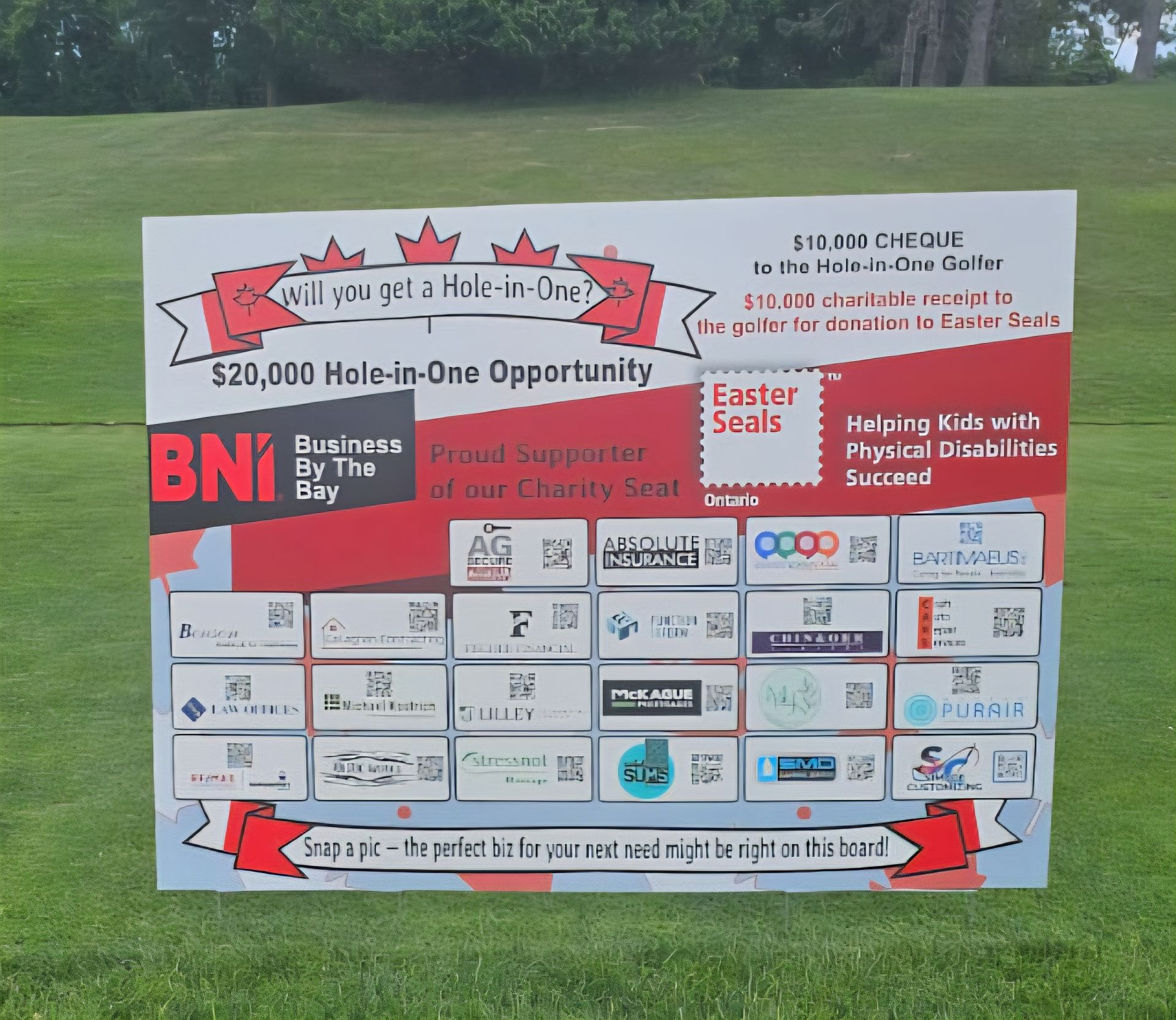 Sign on a golf course: Hole-in-one opportunity with sponsors. Supports Easter Seals, Helping Kids with Physical Disability.
