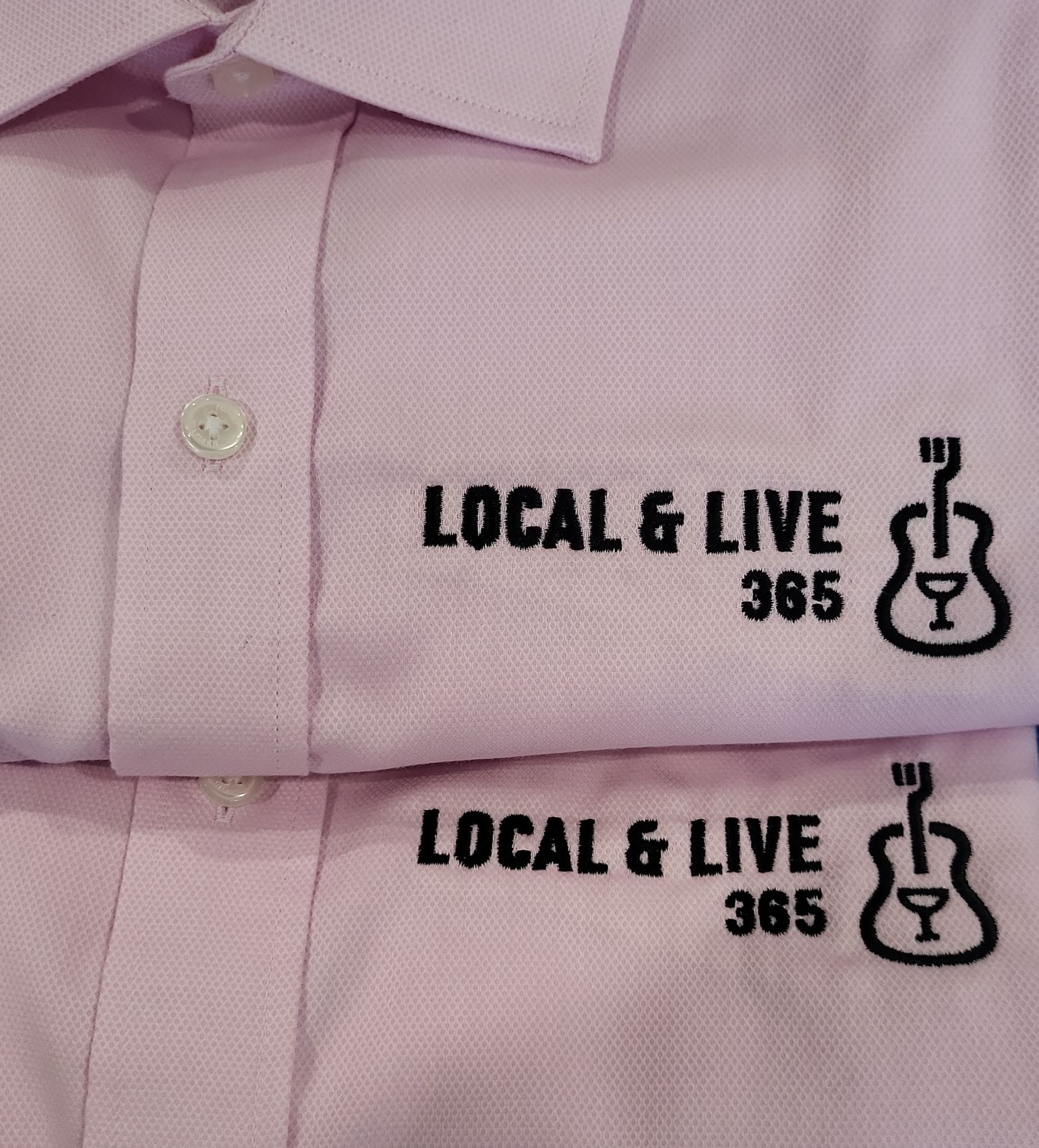 Pink polo shirts with black embroidered 