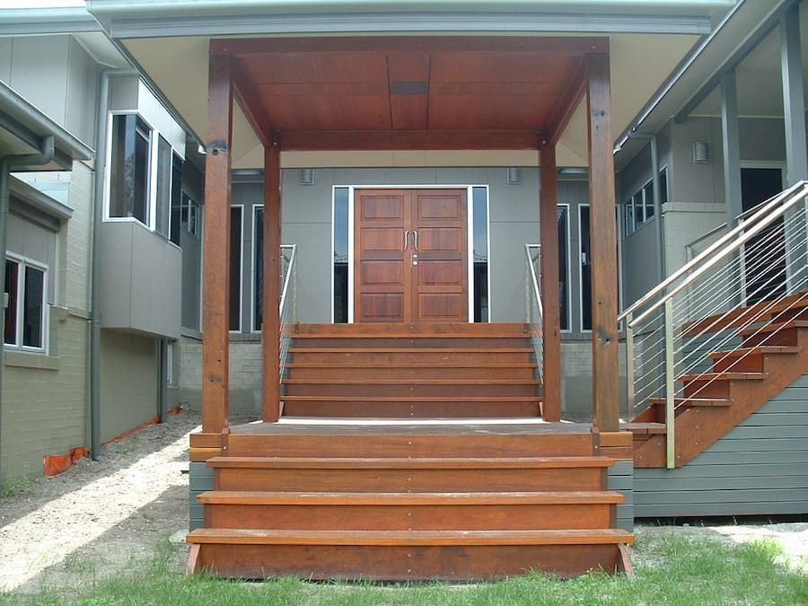 House With Wooden Front Door And Stairs - Previous Projects in South Nowra, NSW
