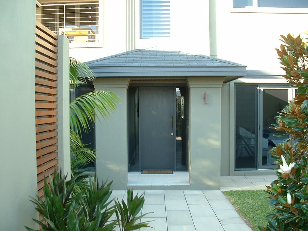 A Small Building With A Door And A Window - Previous Projects in South Nowra, NSW