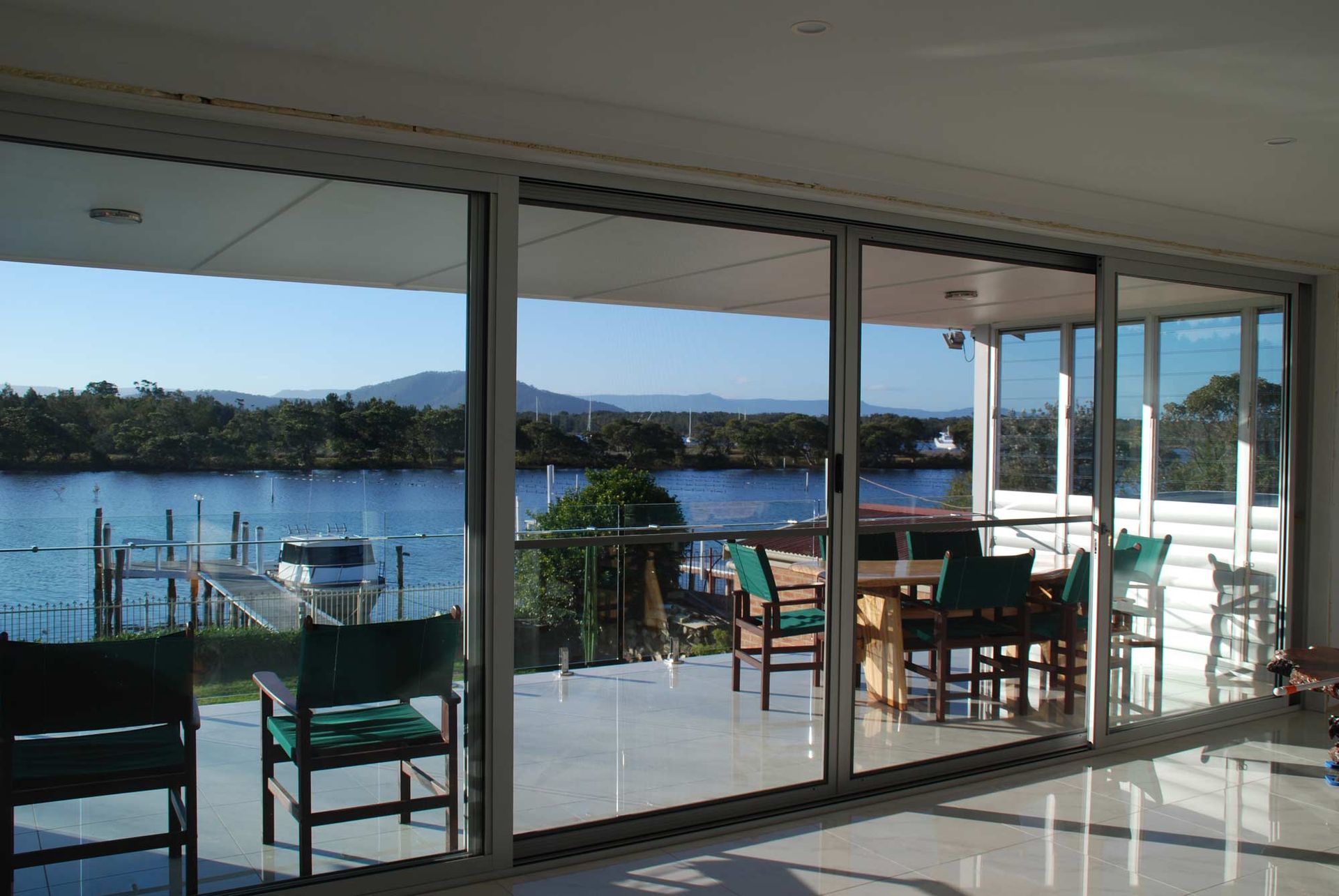 Full Sliding Door in a Restaurant — Glass Windows & Doors in Shoalhaven, NSW