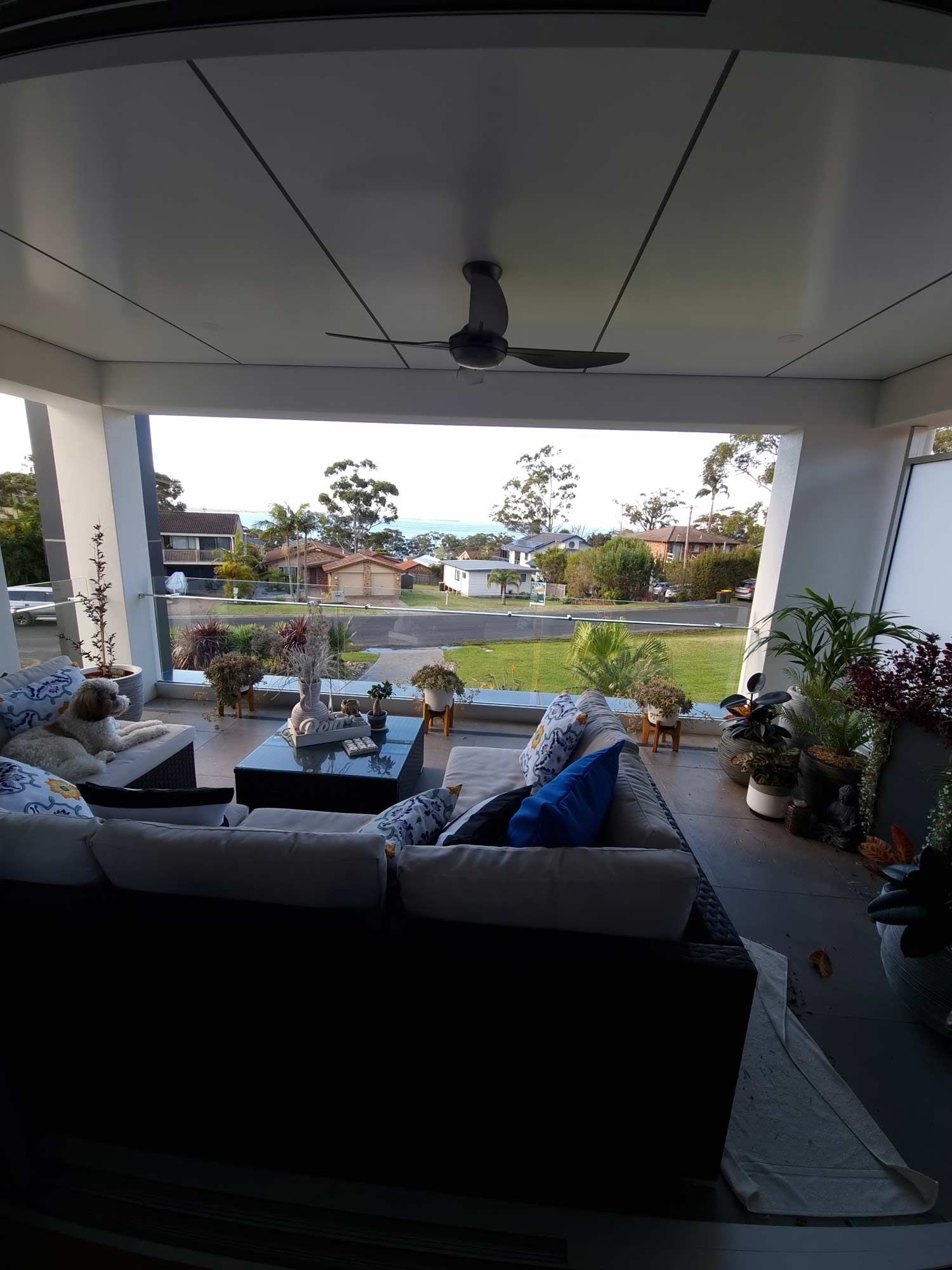 Balustrades in a Patio with Sofa — Glass Windows & Doors in Shoalhaven, NSW
