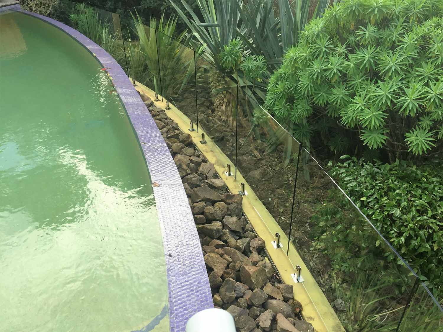 A Pool with Glass Balustrades — Glass Windows & Doors in Shoalhaven, NSW