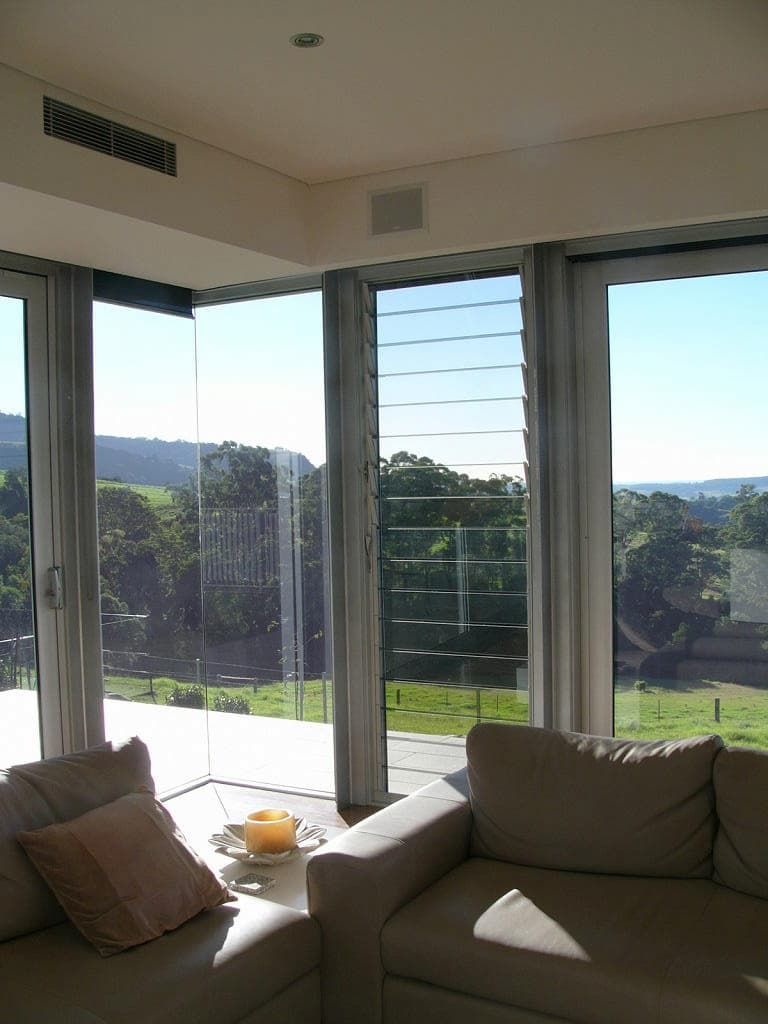 A Furnished Living Room With A Huge Windows - Previous Projects in South Nowra, NSW