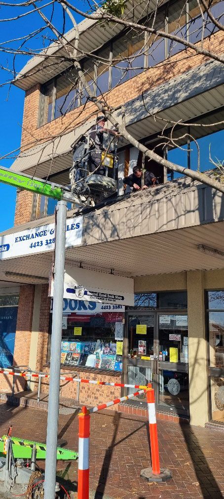 Installing Glass in a Shopfront — Glass Windows & Doors in Shoalhaven, NSW