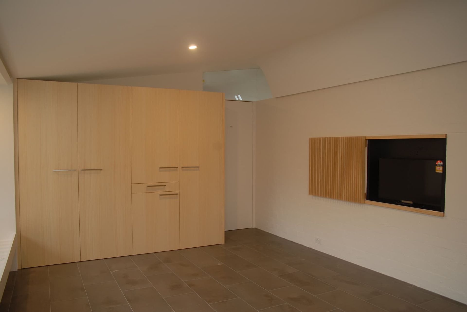 Empty Room With Scandinavian Cabinet - Previous Projects in South Nowra, NSW