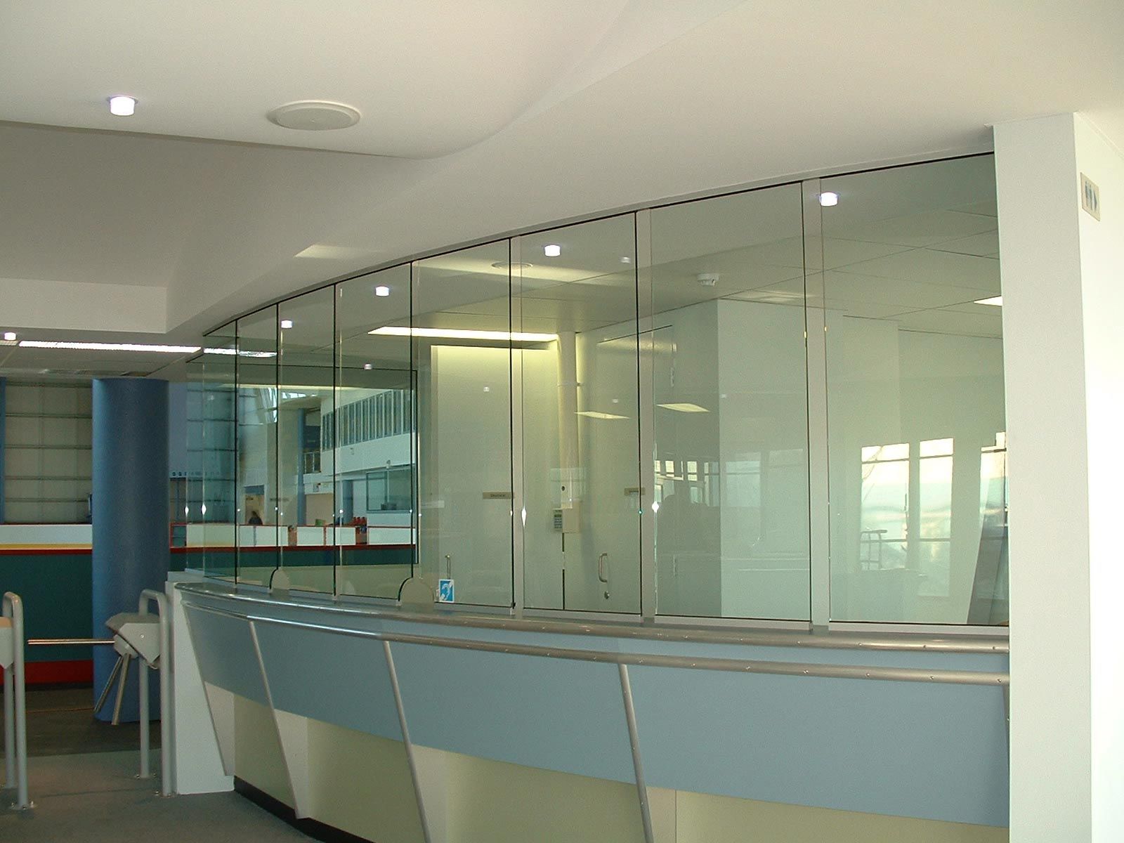 Inside Stadium with High Glass Partition — Glass Windows & Doors in Shoalhaven, NSW
