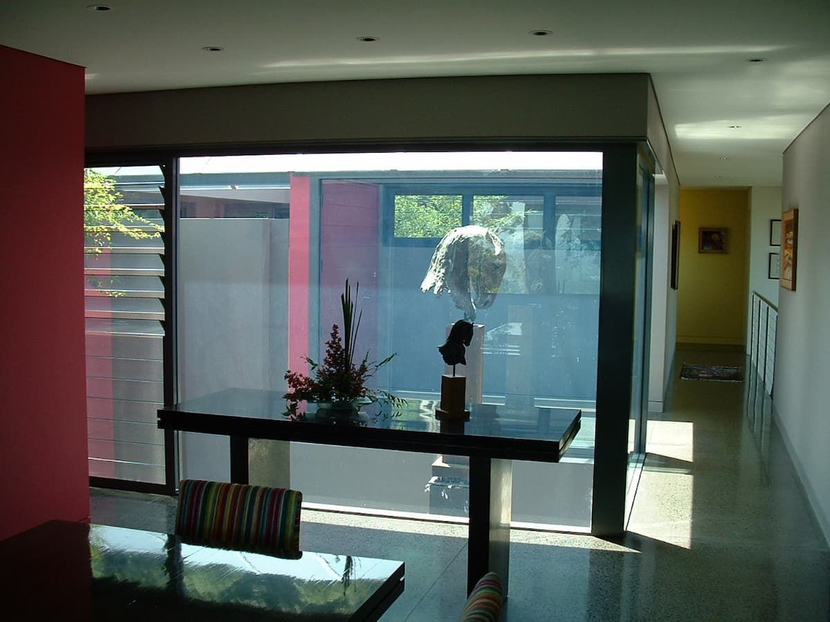 A Glass Table With A Vase On Top - Previous Projects in South Nowra, NSW