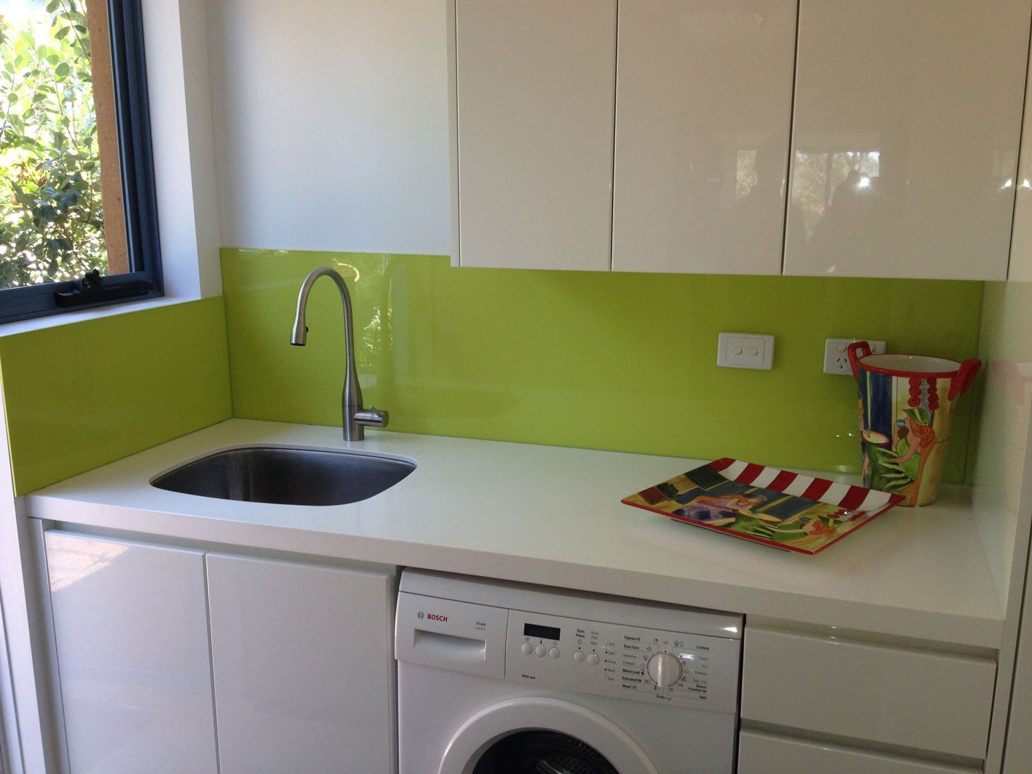 A Laundry Room with White and Green Paint — South Coast Glass in Shoalhaven, NSW
