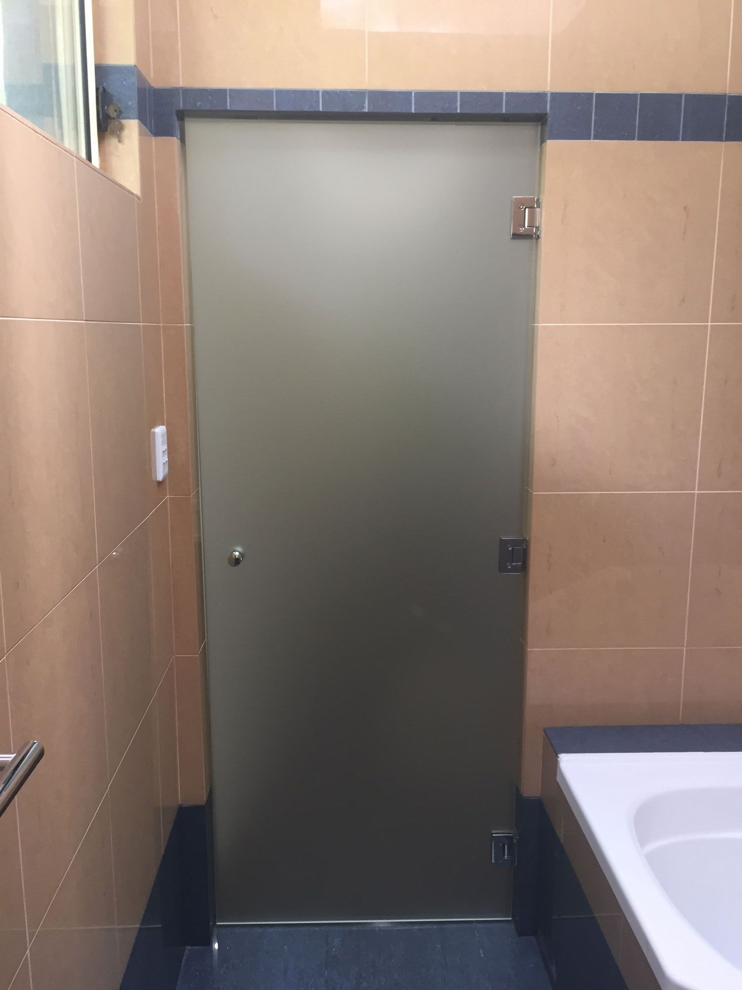 Comfort Room Glass Door — Glass Windows & Doors in Shoalhaven, NSW