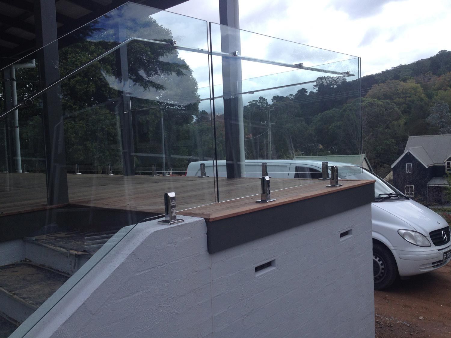Balustrades in a Patio Corner — Glass Windows & Doors in Shoalhaven, NSW