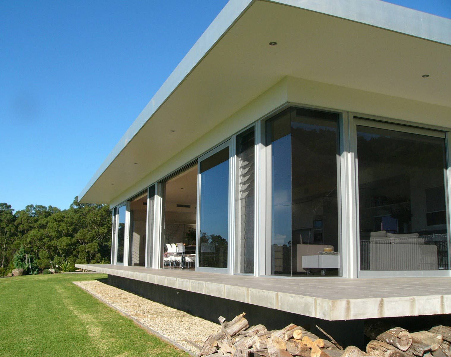 A Modern House with Sliding Doors in Corners  — South Coast Glass in Shoalhaven, NSW