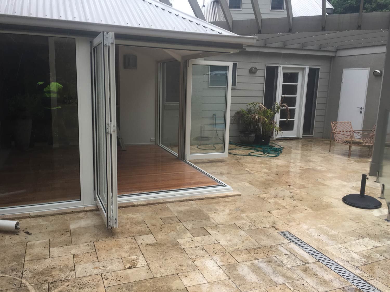 A House with Folding Door in Corner — Glass Windows & Doors in Shoalhaven, NSW