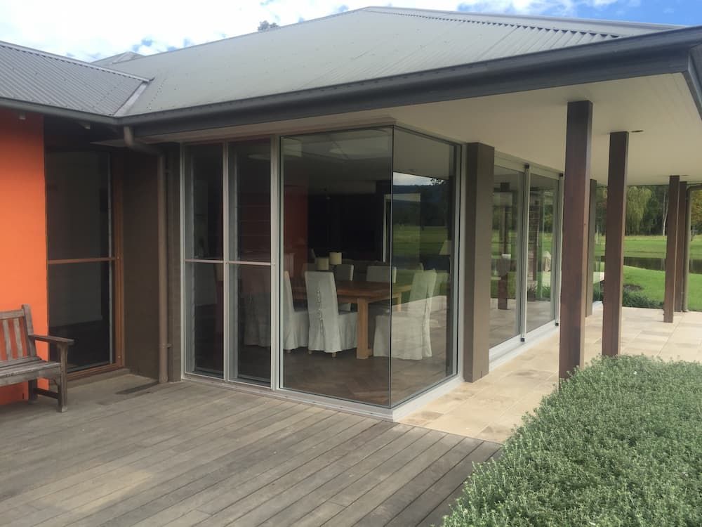 Patio Sliding and Stacking Shutters — Previous Projects in South Nowra, NSW
