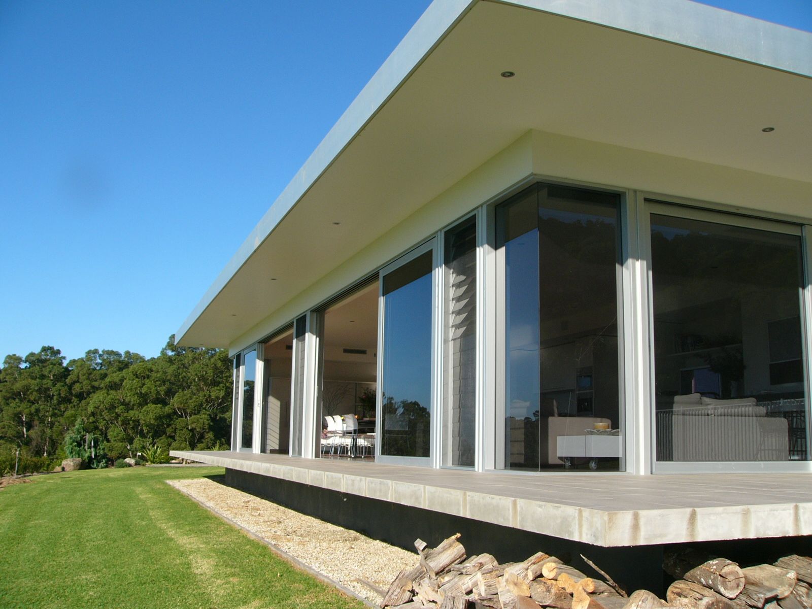 Side view of the glass door house— Previous Projects in South Nowra, NSW
