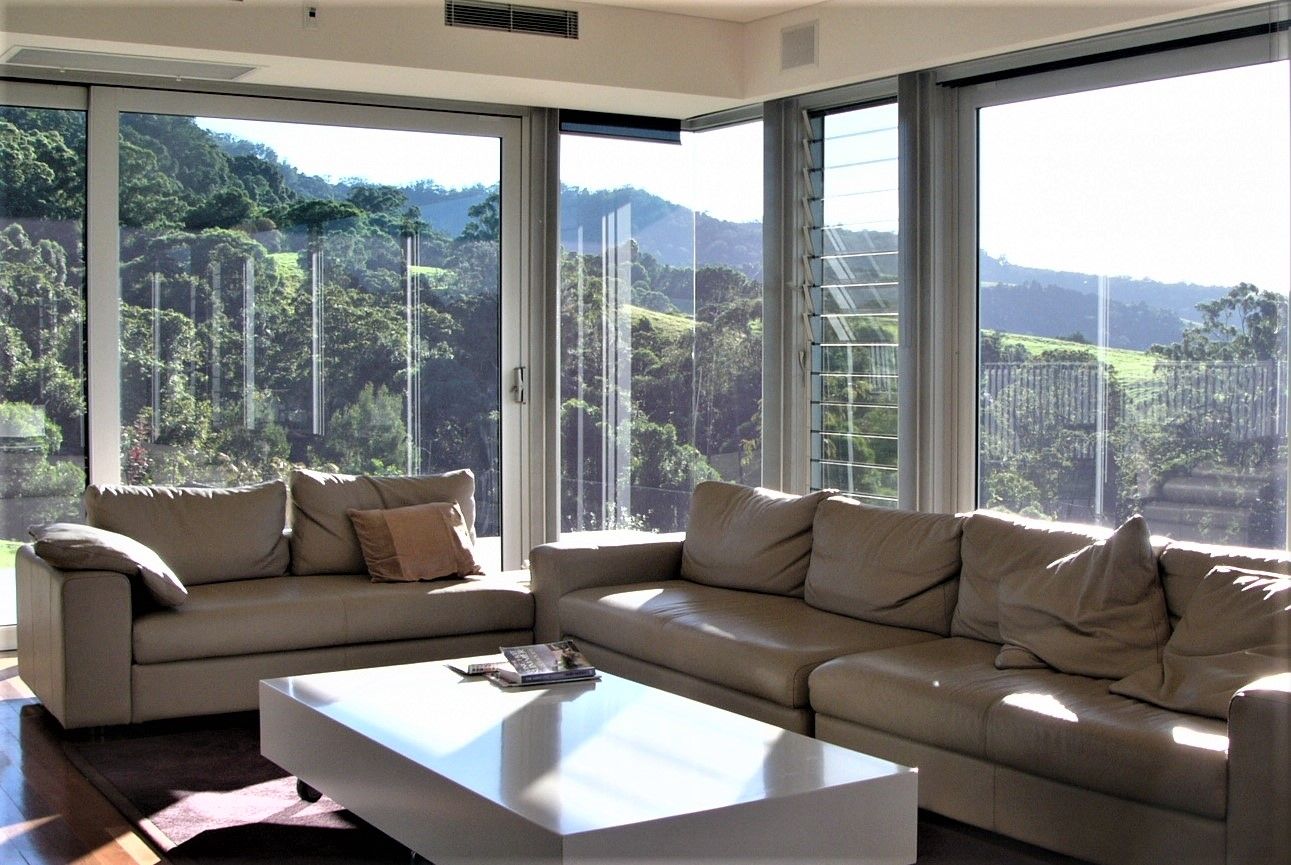 A Living Room with Full Ventilation — Glass Windows & Doors in Shoalhaven, NSW