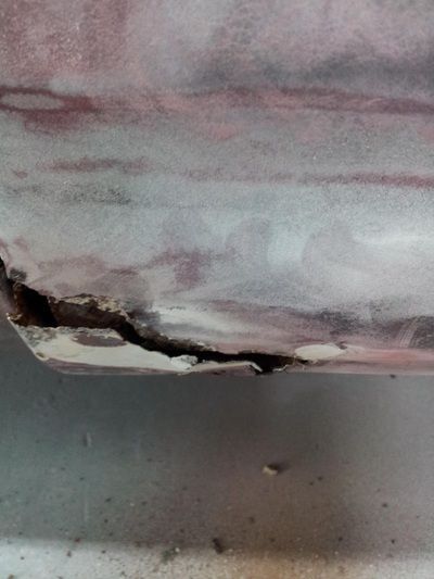 A close up of a piece of paper with a hole in it