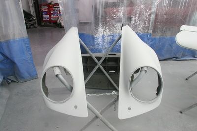 A pair of white headlights