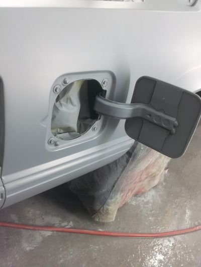 A close up of a car with the door open