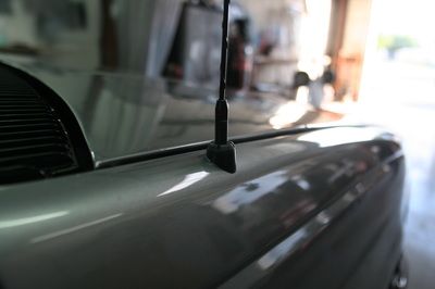 A car with a small antenna on the side of it