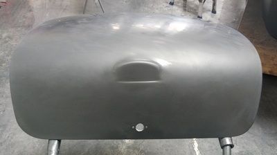 A large metal object is sitting on top of a table